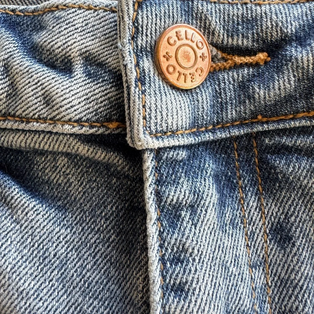 Cello trendy light blue jeans distressed hem  junior size 3